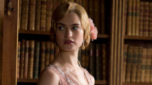 316063-downton-abbey-lady-rose-looks-caught-up-in-something